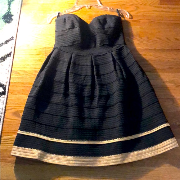 black and gold swing dress